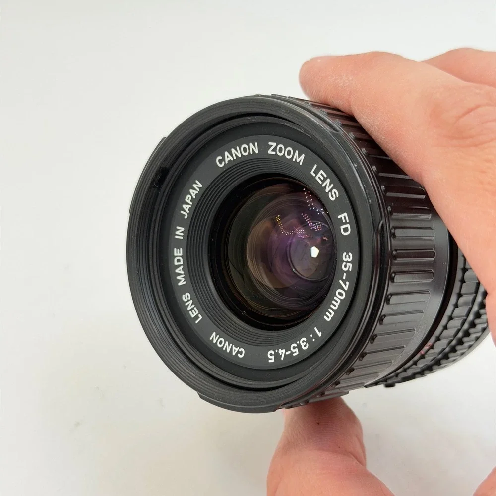 Canon Zoom Lens FD 35-70mm 1:3.5-4.5 Macro Film Camera Lens W/ Tiffen UV Filter